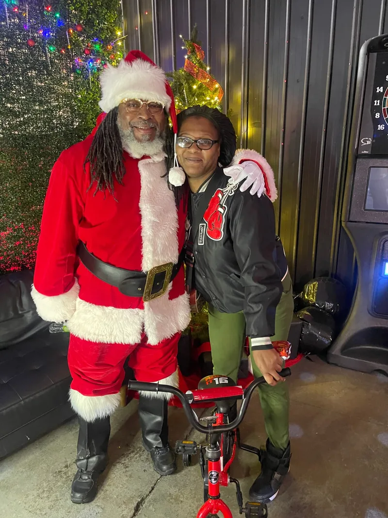 Community members at the Toys for Tots 2024 celebration