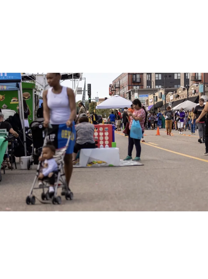 Neighbors connecting at Open Streets West Broadway 2025
