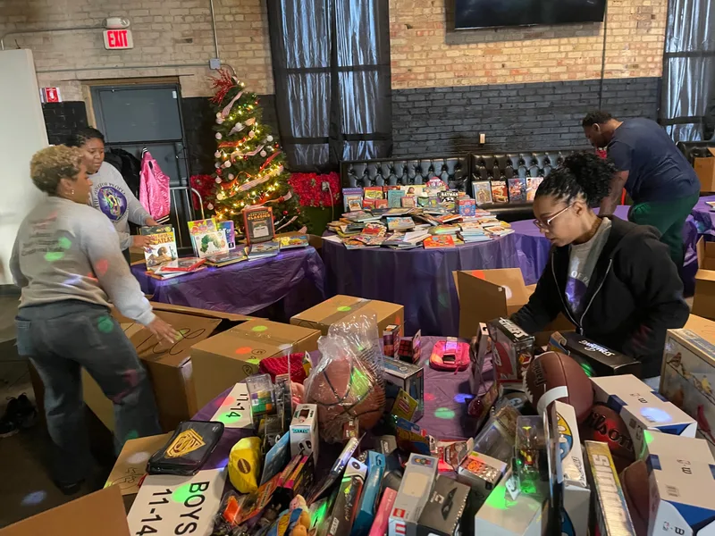 Guests at the Toys for Tots 2024 holiday gathering